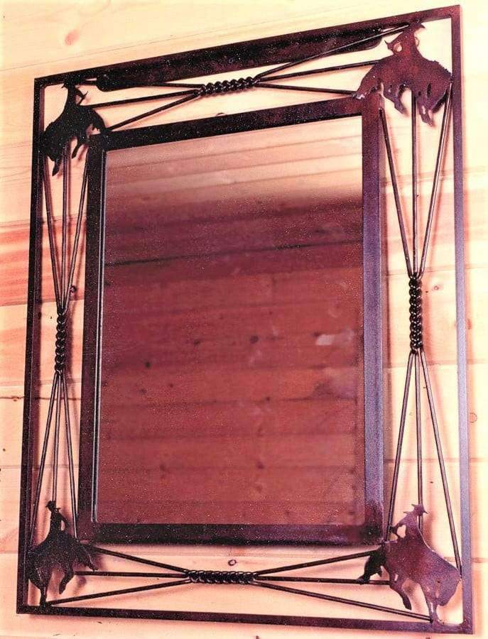 Hand forged iron mirror frame with cowboy bronc and braided iron rods. Made in the USA. Free Shipping. Your Western Decor