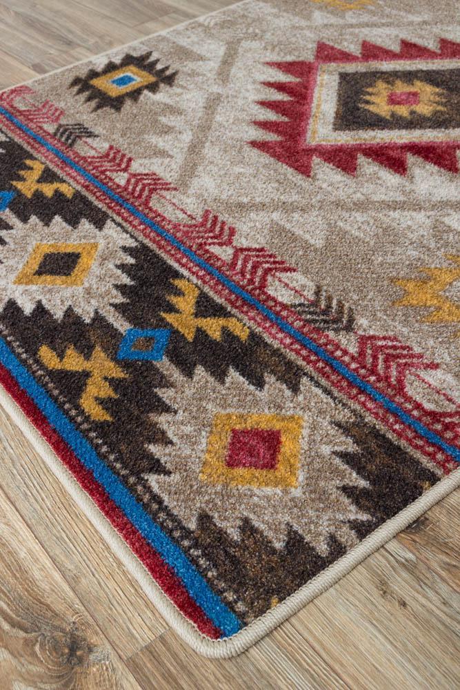 Whiskey river beige Aztec area rug serged edges. Made in the USA. Your Western Decor