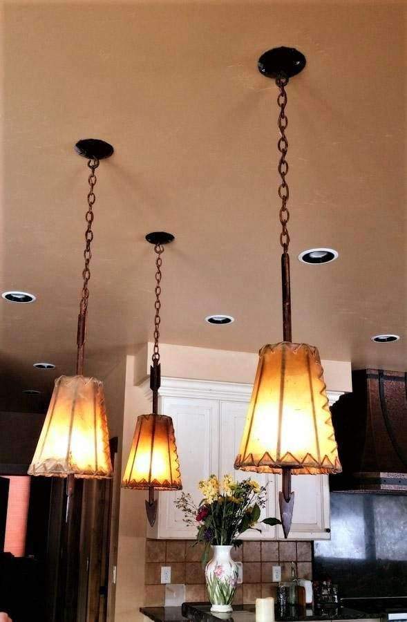 Fort Rock Rawhide & Iron Rod Arrow Pendant Lights. Made in the USA by hand.