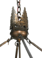 Metal cut-out fir trees a-top lodge pendant light. Custom crafted in the USA