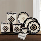 Southwestern dinnerware and canister set in black, beige, and tan geometirc patterns 