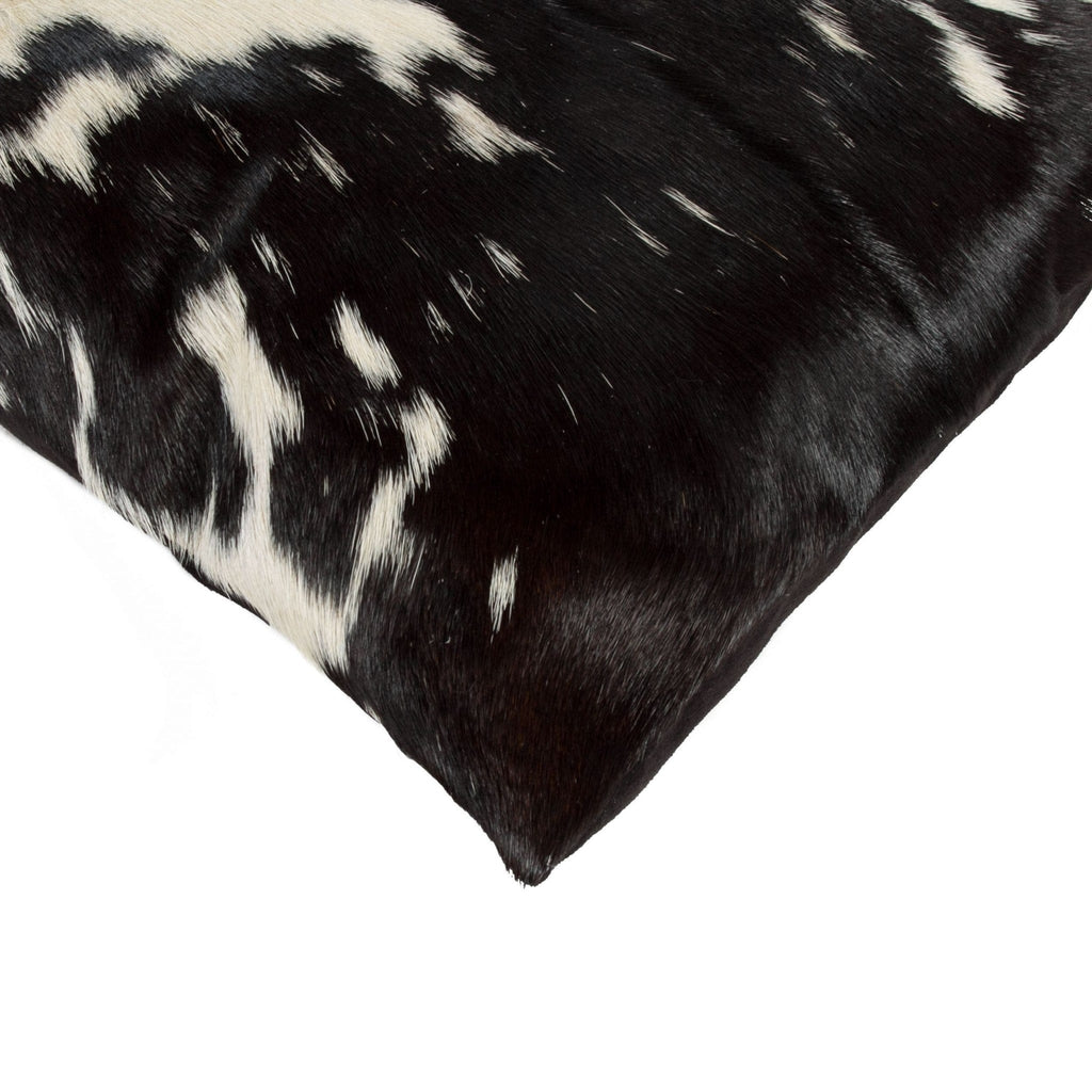 Black and white cowhide pillow corner detail - Your Western Decor