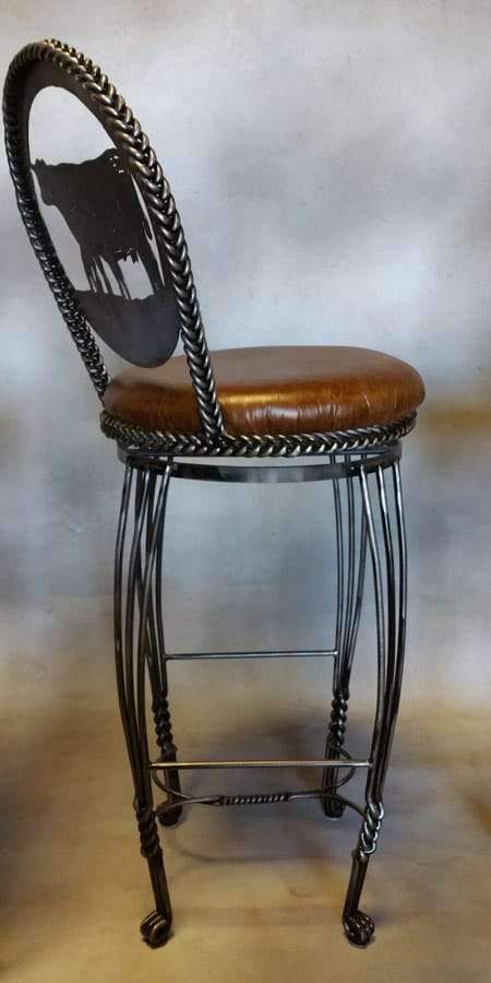 Iron ranch style rustic bar stool made in the USA featuring cattle. Hand forged. Your Western Decor, LLC