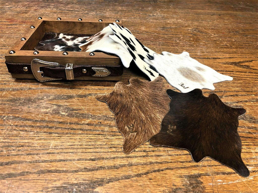 Cowhide coaster set with custom brand. Your Western Decor. Free Shipping.