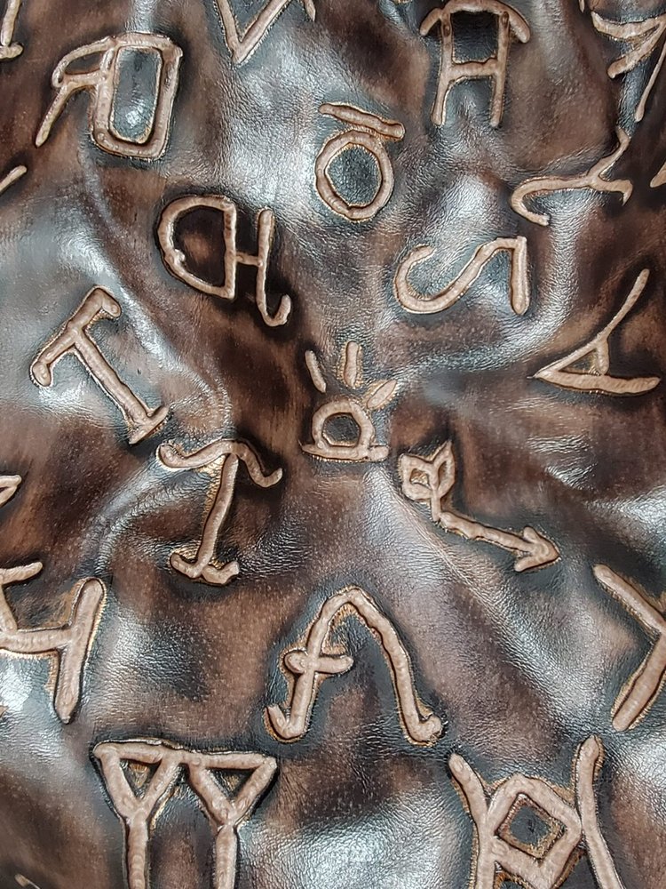Brown and copper brands embossed leather hide - Your Western Decor