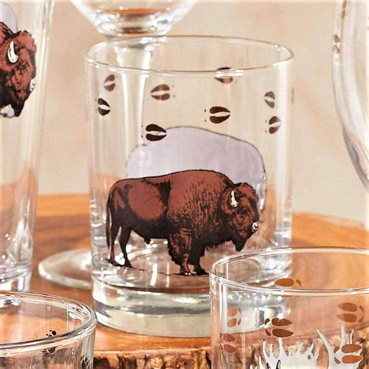 Double old fashioned glasses with printed buffalo and buffalo tracks. Made in the USA. Your Western Decor