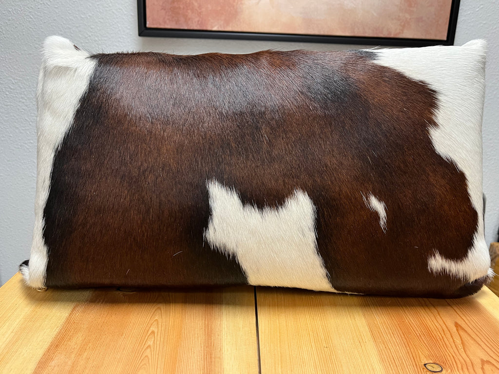 Chocolate and white 22x13 cowhide throw pillow - Your Western Decor