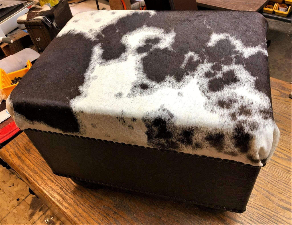 Tri color cowhide and dark brown distressed leather western ottoman stool. Hand made in the USA. Your Western Decor