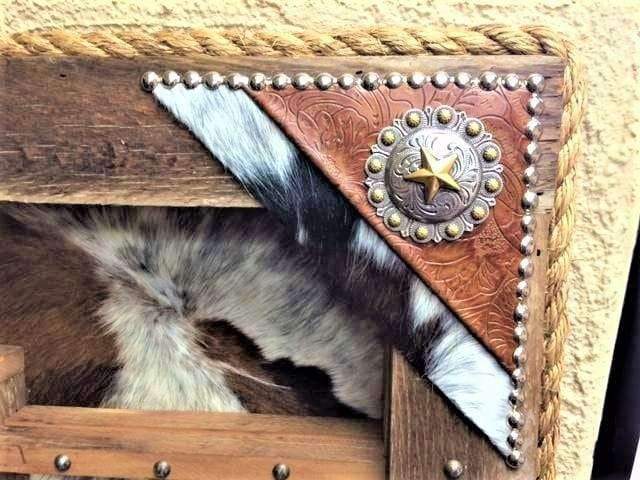 Custom made western buckle display case. Cowhide, leather and nail head accents. Made in the USA. Your Western Decor