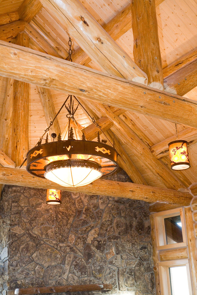 Rustic rawhide and iron custom chandelier. Made in the USA - Your Western Decor, LLC