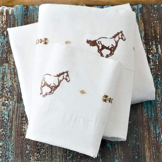 Off white, embroidered running horses sheets. Your Western Decor