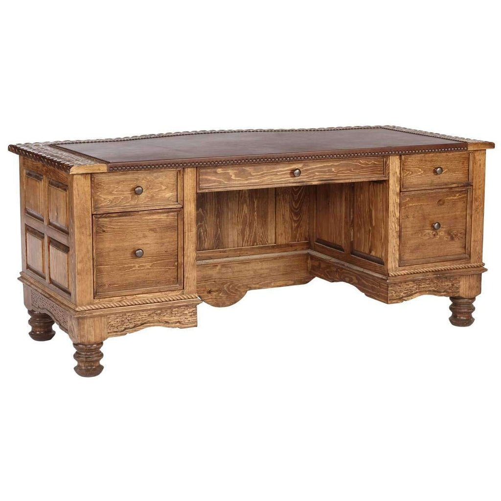 Executive western office desk with carvings and leather surface.. Your Western Decor