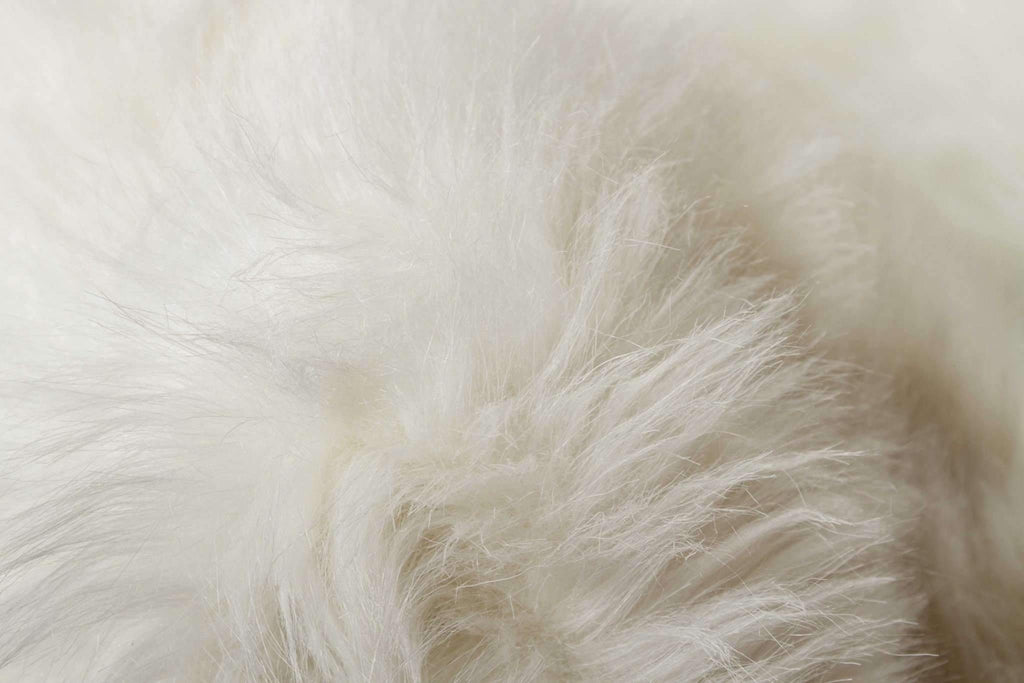 Detail of white faux fur area rug - Your Western Decor