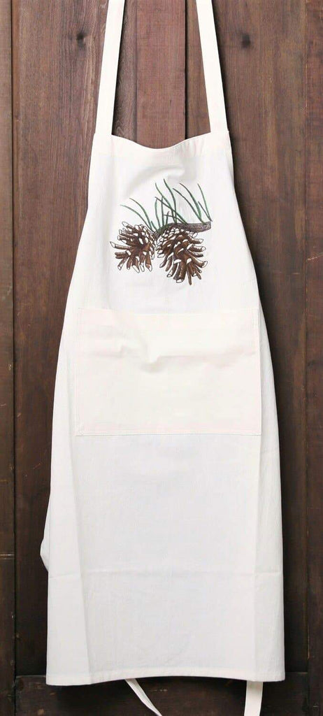 Ivory Cotton kitchen apron with embroidered pine cone design. Your Western Decor. 