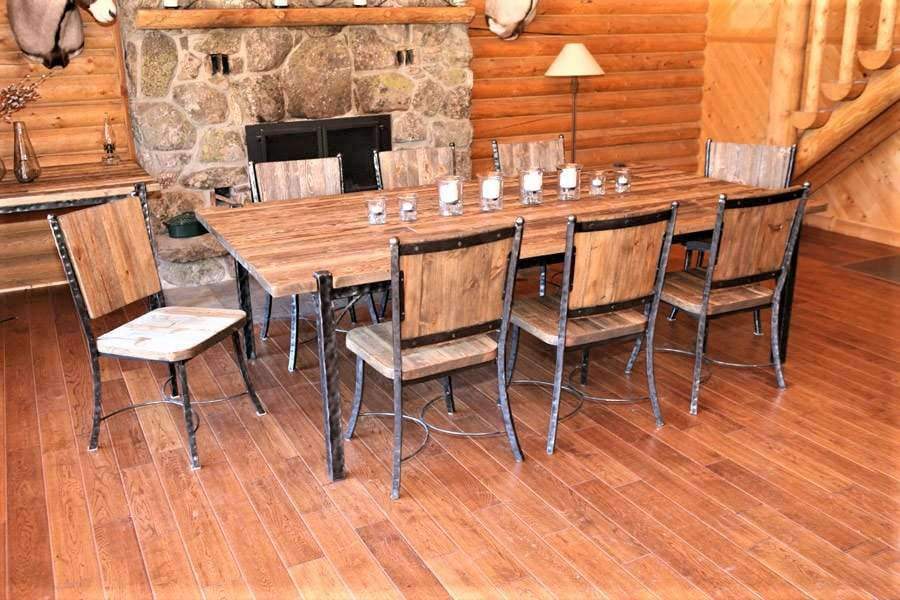 Hammered iron and wood rustic dining table. Handmade in the USA. Your Western Decor