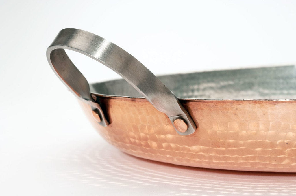 Hammered copper paella pan handle detail - Your Western Decor