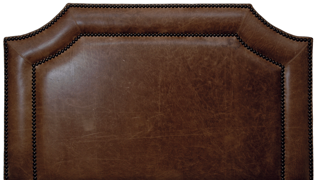 Dark brown distressed butte leather headboard with nail head trim. Western theme. Made in the USA. Your Western Decor