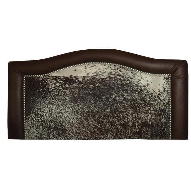 Black and off-white peppered cowhide and dark brown leather upholstered western headboard. Made in the USA. Your Western Decor