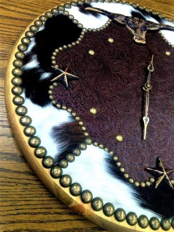 Custom made western clocks with cowhide and leather. Made in the USA. Your Western Decor