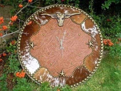 Cowhide and leather custom made western wall clocks. Your Western Decor. 