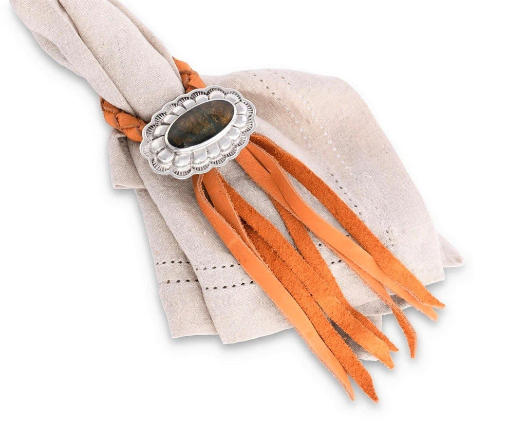 Genuine leather and  pewter concho napkin rings. Your Western Decor