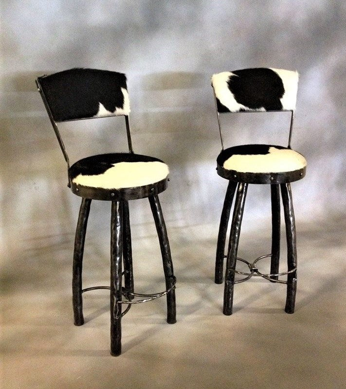 Black and white cowhide upholstered swivel bar stools with backs - Made in the USA - Your Western Decor