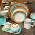 Hand-crafted and hand-painted Southwestern, Spanish dishes in white, turquoise, orange, red, and green - Made in the USA