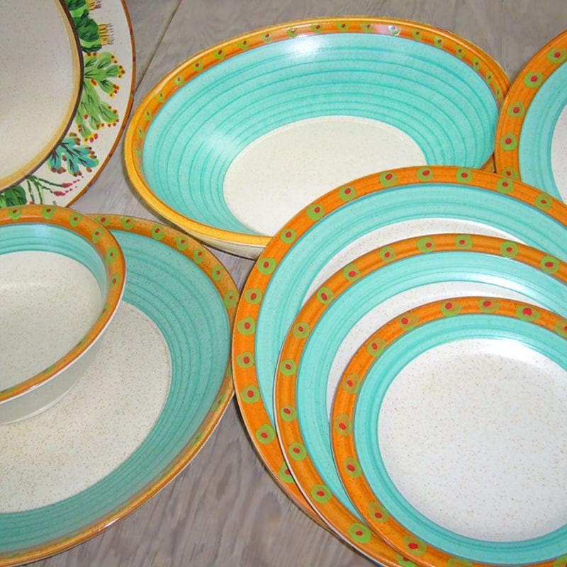 Light blue, speckled cream, red, orange and green hand painted Southwestern dishes. Made in the USA. Your Western Decor