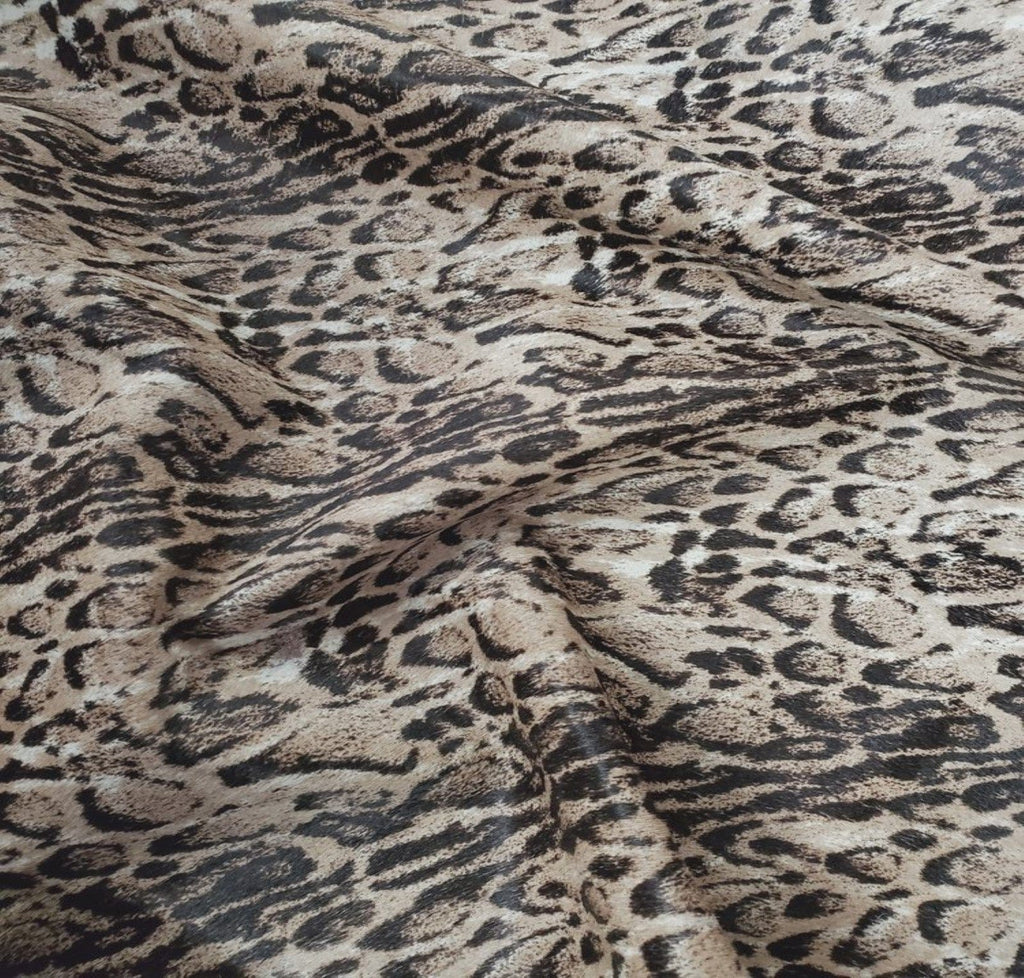 Snow Leopard Stencil on Beige Cowhide - Your Western Decor Design Studio Upholstery