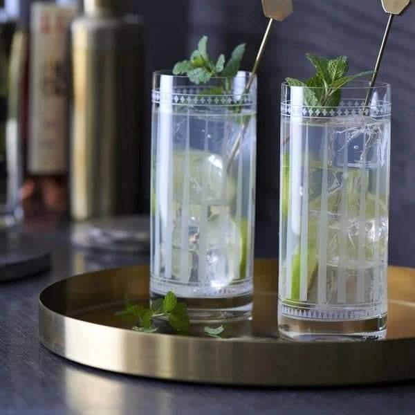 Pair of tall crystal drinking glasses. Your Western Decor