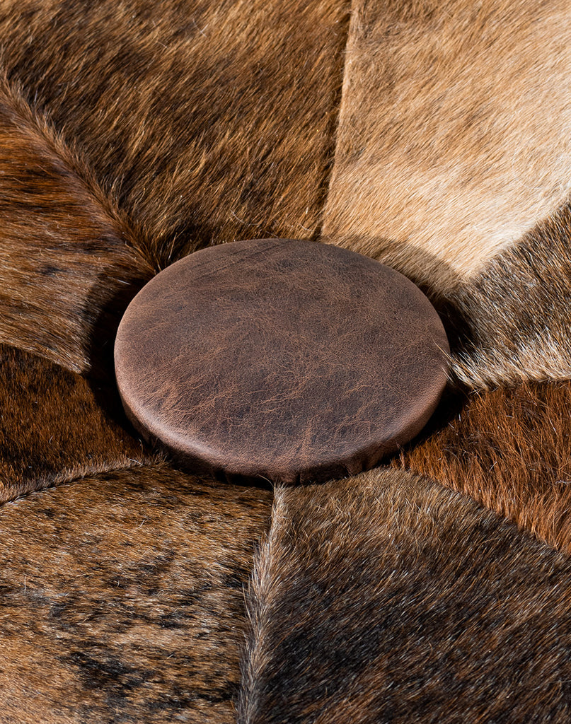 Cowhide and leather ottoman top detail - Your Western Decor