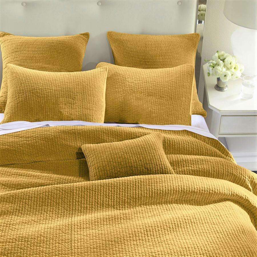 Tuscan yellow cotton coverlet