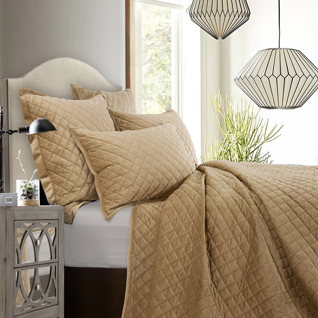 Velvet Diamond Quilted Euro Sham in Oatmeal on a bed from HiEnd Accents