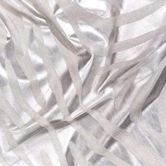 silver zebra stencil on white cowhide rug - Your Western Decor